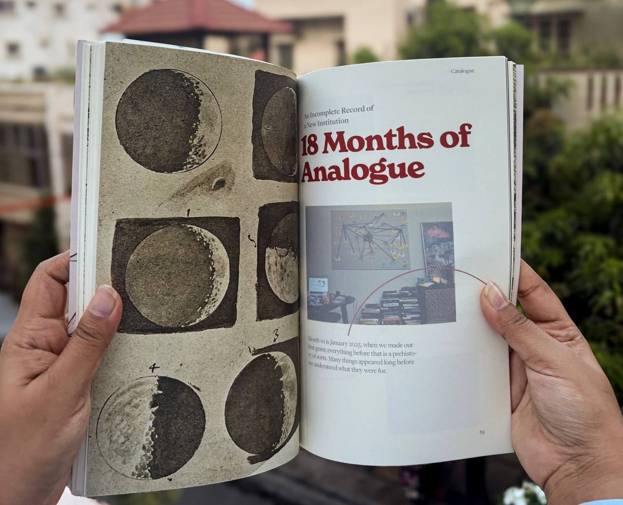 An open copy of catalogue showing the 18 Months of Analogue spread with moon illustrations
