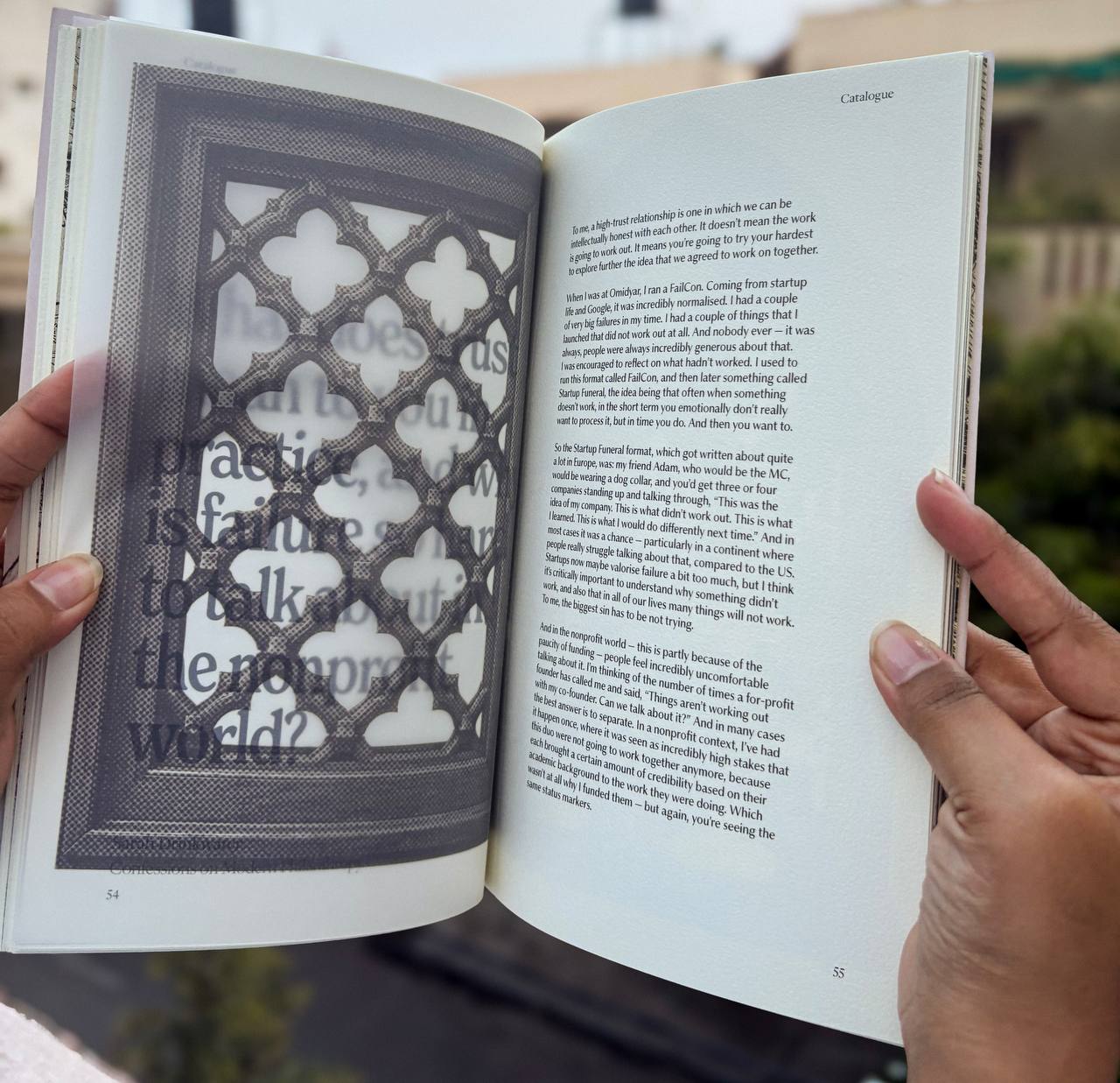 An open copy of catalogue showing an illustrated spread from Confessions on Modern Philanthropy